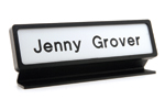 Desk Nameplates have a plastic designer frame.