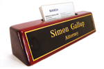 Add business cards to your engraved desk nameplate.